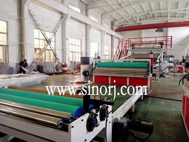 仿大理石板生產(chǎn)線，地板革生產(chǎn)線，三輥四輥集裝箱發(fā)貨中